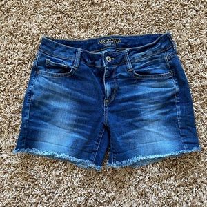 Junior’s faded blue Arizona shorts
